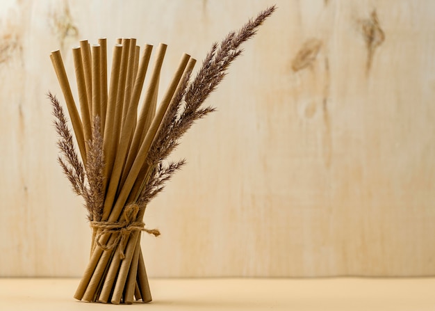 Tied bamboo organic straws and lavender copy space