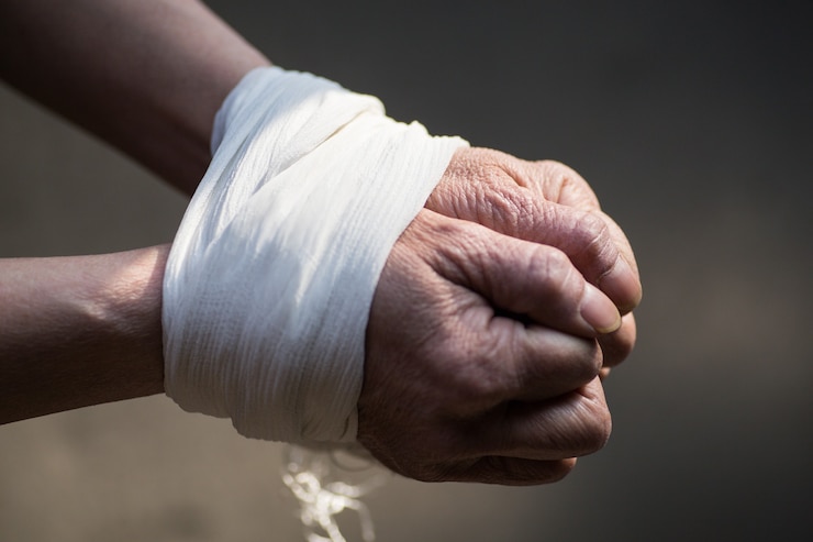 Free Photo tied up hands of a middle-aged woman