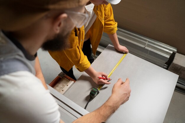 Tiler working on renovation of apartment