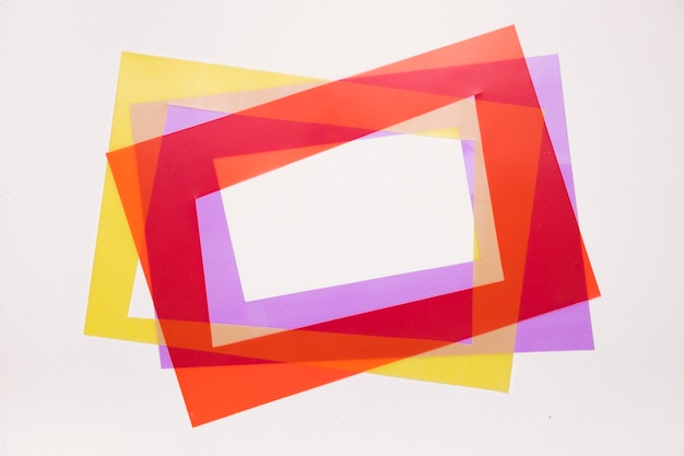 Tilt red; yellow and purple frame on white background