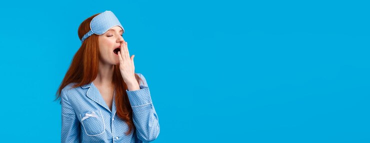 Free Photo time to bed sleepy and tired cute sensual feminine redhead woman in nightwear wear pyjama and sleep