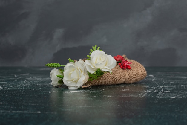 Tiny beautiful bouquet on marble table