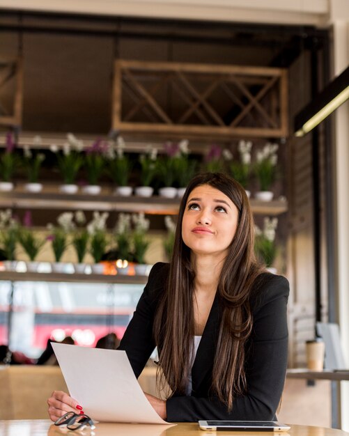 Tired brunette businesswoman 