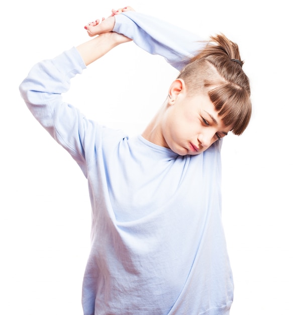 Tired young woman stretching her arms