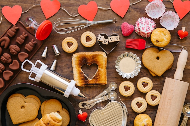 Free photo toast amidst pastry and bakeware