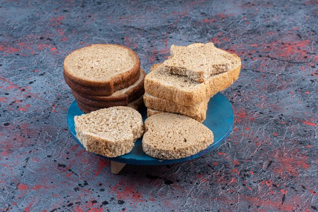 Toast bread slices in a blue platter. 