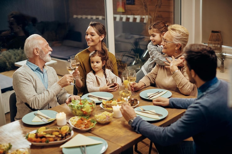 Free Photo a toast for many upcoming family dinners