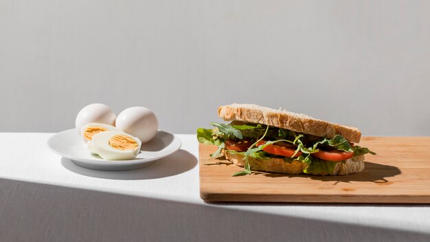 Toast sandwich with tomatoes and hard-boiled eggs