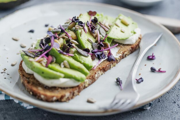Toast with avocado on plate