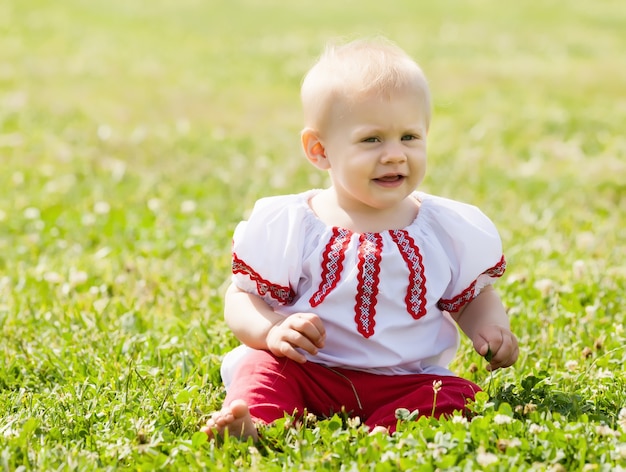 toddler in traditional folk clothes