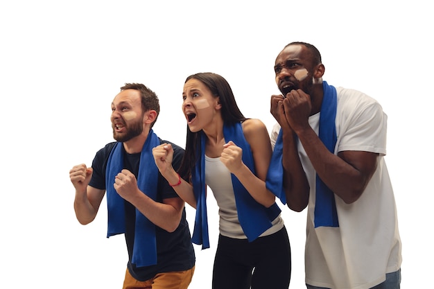 Togetherness. Multiethnic soccer fans cheering for favorite team with bright emotions isolated on white background.