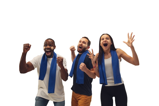 Free photo togetherness. multiethnic soccer fans cheering for favorite team with bright emotions isolated on white background.