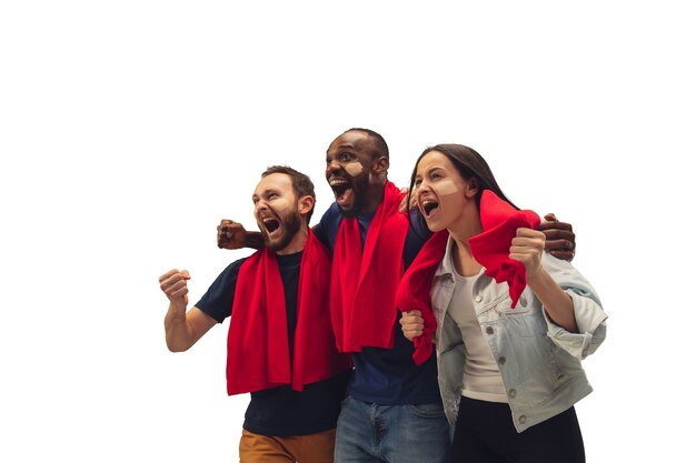 Togetherness. Multiethnic soccer fans cheering for favorite team with bright emotions isolated on white background.