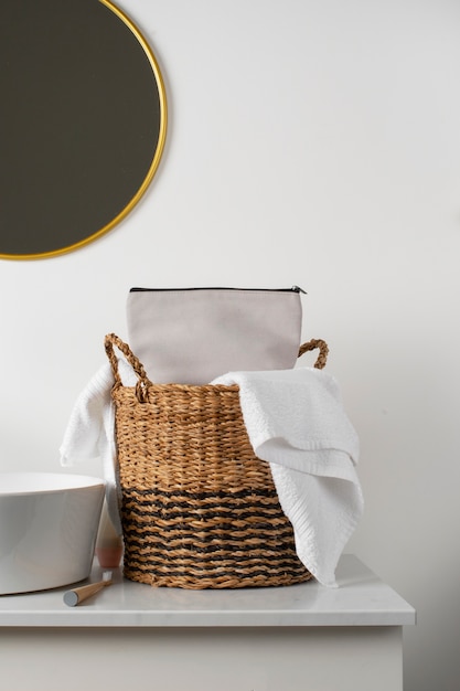 Free photo toilet bag and basket  on cabinet