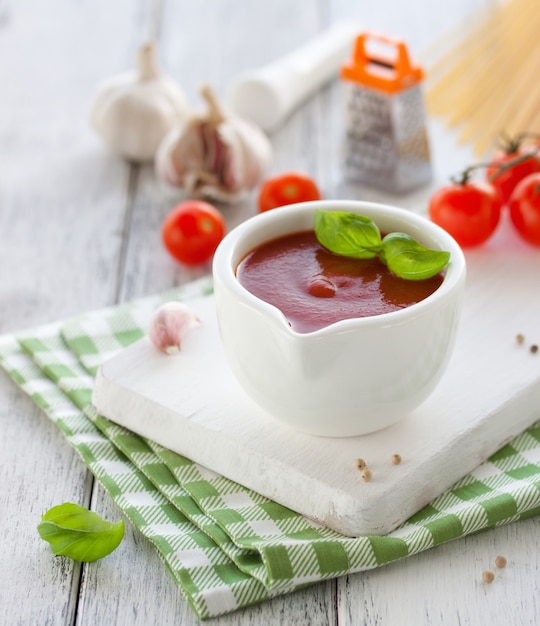Tomato sauce in a white bowl