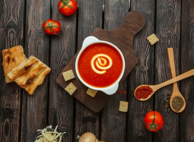 Tomato soup on the table top view