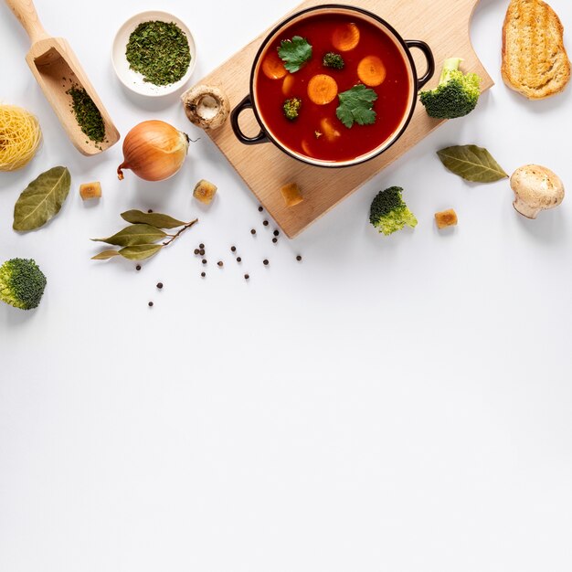 tomato soup on wooden board