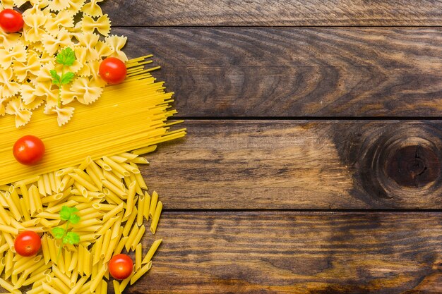 Tomatoes and herbs on pasta