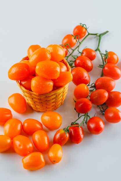 Tomatoes in a wicker basket. high angle view.