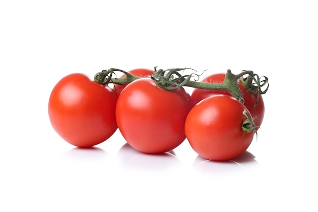 Tomatos on a white surface