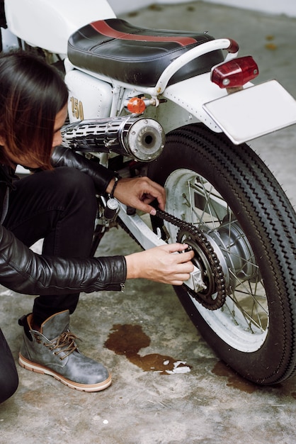 Top angle view of biker repairing his bike