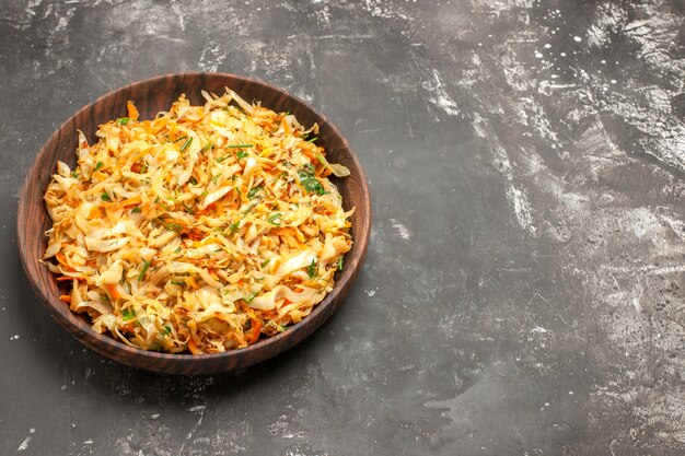 Top close-up view cabbage with carrots the appetizing carrots and cabbage on the plate