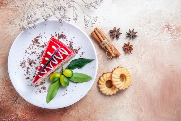 Top close-up view a cake cookies star anise cinnamon sticks an appetizing cake