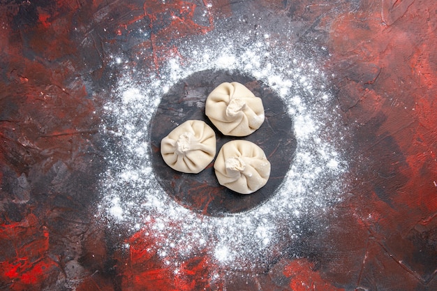 Top close-up view flour khinkali flour on the table