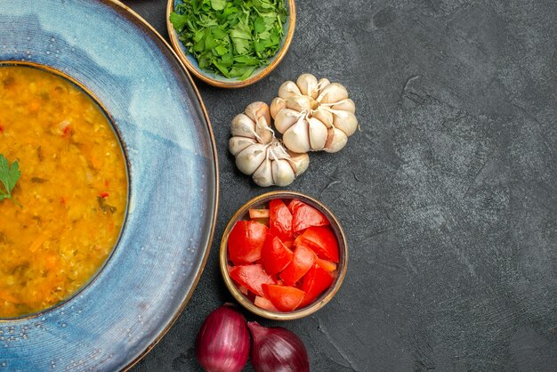 Top close-up view lentil soup an appetizing lentil soup herbs garlic tomatoes onions