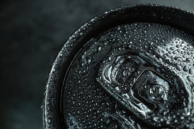 Top close view soda can on dark background