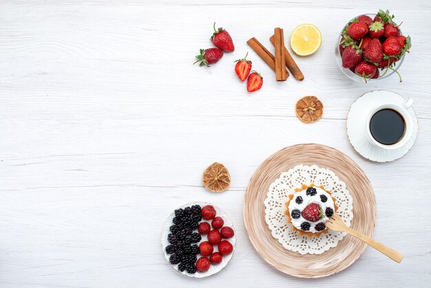 Top distant view yummy creamy cake with berries along with cinnamon cup of coffee berries on light desk, cake sweet berry