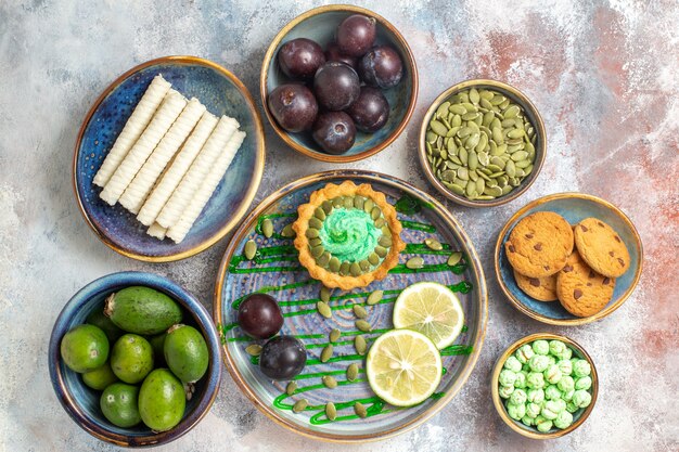 top down view charming yummy snack with biscuits ripe plums feykhoas sweeties