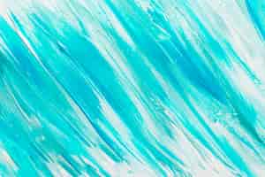 Free photo top view of abstract blue paint brush strokes on surface