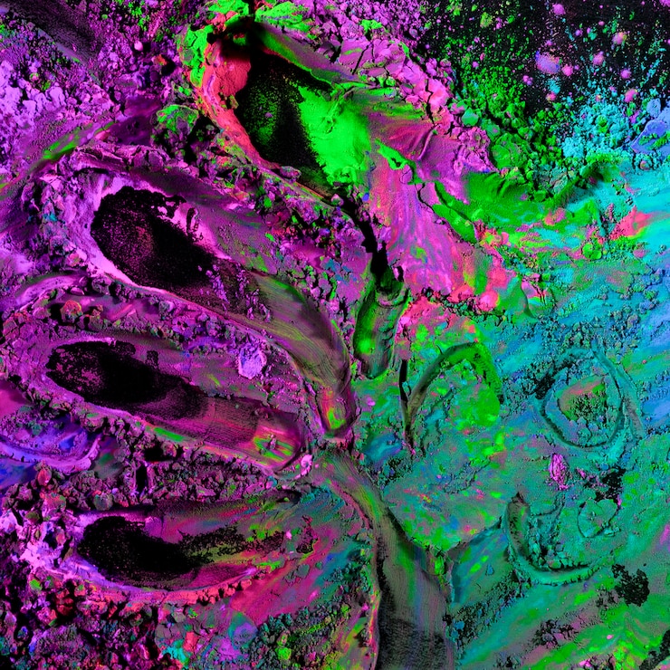 Free Photo top view of a abstract bright colorful holi powder 