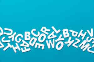 Free photo top view of alphabet letters with copy space for education day