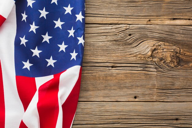 Top view of american flag on wood with copy space