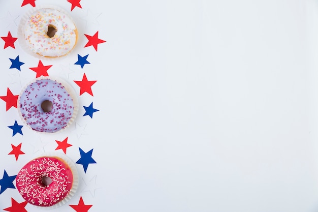 Top view of American stars and donuts