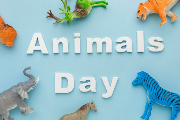 Top view of animal figurines for animal day