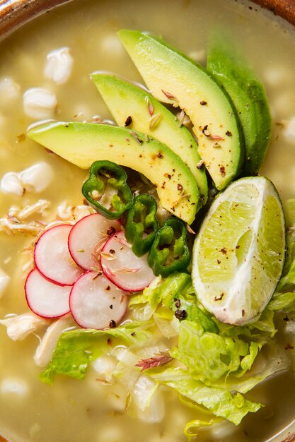 Top view on appetizing pozole bowl