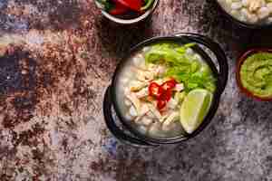 Free photo top view on appetizing pozole bowl