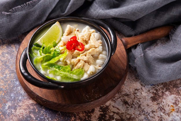 Top view on appetizing pozole bowl