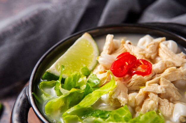 Top view on appetizing pozole bowl