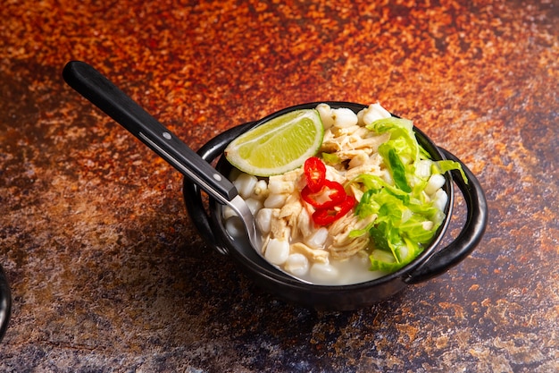 Free photo top view on appetizing pozole bowl