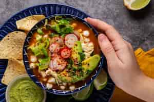 Free photo top view on appetizing pozole bowl