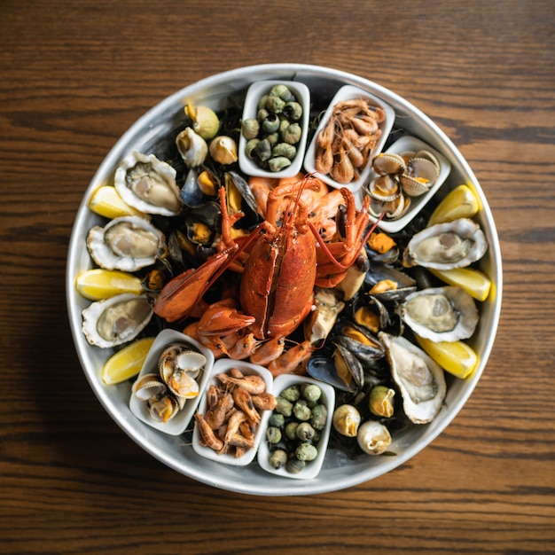 Top view of appetizing seafood mix on a wooden table