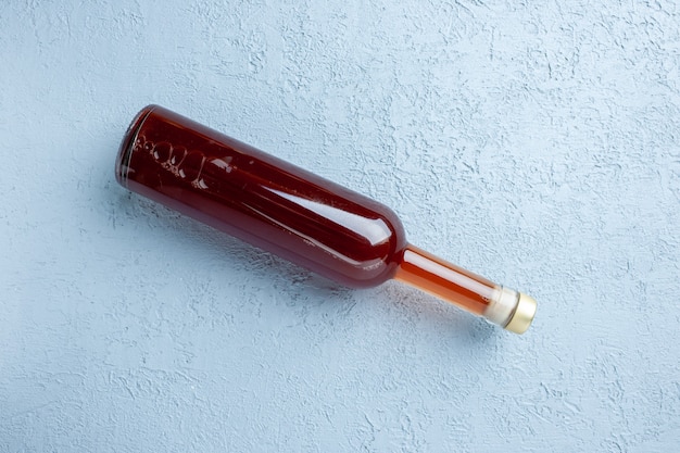Top view apple vinegar in bottle on white background juice color photo red fresh drink sour food