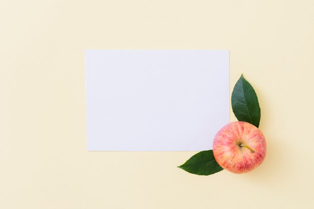 Top view apple with paper