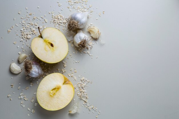 Top view apples and garlic arrangement