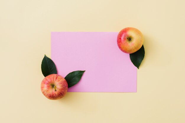 Top view apples with paper