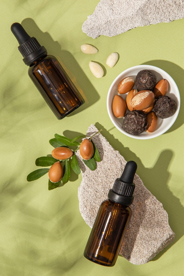 Free Photo top view argan oil arrangement